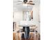 Dining area features a modern table and chairs, open to kitchen with stainless steel appliances at 7373 E Iowa Ave # 1124, Denver, CO 80231