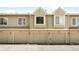 Townhome exteriors with garage doors and siding at 7373 E Iowa Ave # 1124, Denver, CO 80231
