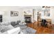 Inviting living room features a cozy fireplace, stylish decor, and hardwood floors throughout the space at 7373 E Iowa Ave # 1124, Denver, CO 80231
