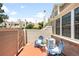 Cozy patio with chairs and table at 7373 E Iowa Ave # 1124, Denver, CO 80231