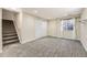 Finished basement offers versatile space with plush carpeting, closet, and a window for natural light at 11302 Tumbleweed Way, Parker, CO 80138