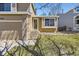 Attractive home exterior with a well-manicured lawn and inviting entryway at 11302 Tumbleweed Way, Parker, CO 80138
