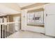 Bright hallway featuring tile floors, built-in storage, and a window seat with a view at 11302 Tumbleweed Way, Parker, CO 80138