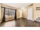 Comfortable living room showcasing wood floors and ample natural light at 11302 Tumbleweed Way, Parker, CO 80138