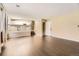 Inviting living room with hardwood floors and access to a modern kitchen at 11302 Tumbleweed Way, Parker, CO 80138