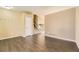 Open-concept living area boasting wood floors and a staircase at 11302 Tumbleweed Way, Parker, CO 80138