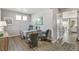 Well-lit office space features neutral wall tones, modern decor, and wood-look laminate flooring at 1907 Mount Monroe Dr, Berthoud, CO 80513