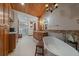 Bright bathroom with a soaking tub, double vanity, and a glass enclosed shower at 239 Aspen Pl, Evergreen, CO 80439