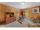 Bright wood-paneled office space with large window offering natural light and a view at 239 Aspen Pl, Evergreen, CO 80439
