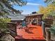 Spacious patio with an outdoor dining area, perfect for entertaining guests and enjoying the fresh air at 239 Aspen Pl, Evergreen, CO 80439