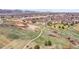 Aerial view of community highlighting walking paths, lush green spaces and natural surroundings at 9538 W San Juan Cir # 104, Littleton, CO 80128