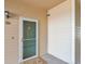 Entryway with a white-trimmed door and welcome mat provides a warm greeting to visitors at 9538 W San Juan Cir # 104, Littleton, CO 80128