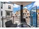 Relaxing balcony with seating, perfect for enjoying the neighborhood views and fresh air at 2036 S Holly St # 1, Denver, CO 80222