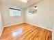 Bright bedroom with hardwood floors, ample natural light and closet at 8590 Faraday St, Denver, CO 80229