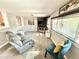 Comfortable living room with plush seating, modern decor, and ample natural light at 8590 Faraday St, Denver, CO 80229