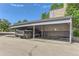 An attached carport offers covered parking for residents at 9837 E Peakview Ave # 7, Englewood, CO 80111