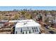 Panoramic aerial view showcasing the city skyline, the home, and the surrounding neighborhood at 117 Elati St # 1, Denver, CO 80223