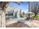 Charming storefront with outdoor seating and a well-maintained sidewalk for relaxing outside at 117 Elati St # 1, Denver, CO 80223