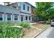 Charming home exterior with well-kept landscaping, mature plants and a classic style at 117 Elati St # 1, Denver, CO 80223
