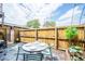 Enjoy the outdoors on the patio with a grill, dining space, and great backyard views at 117 Elati St # 1, Denver, CO 80223