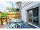 A small fenced-in patio is perfect for outdoor dining, relaxation, and growing potted plants at 117 Elati St # 1, Denver, CO 80223