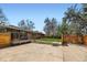 Spacious backyard featuring a wooden fence and a patio, perfect for outdoor entertaining and relaxation at 6773 E Baker Pl, Denver, CO 80224