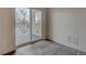 Bedroom with sliding door to private balcony at 14936 E Hampden Ave # 202, Aurora, CO 80014