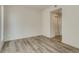 Simple bedroom with hardwood floors and closet at 14936 E Hampden Ave # 202, Aurora, CO 80014