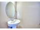 Powder room featuring a pedestal sink with chrome fixtures, ample wall space at 899 Winding Brook Dr, Berthoud, CO 80513