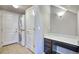 Laundry room featuring a stacked washer/dryer and a desk space at 899 Winding Brook Dr, Berthoud, CO 80513