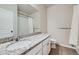 This bathroom features granite countertops and a shower and toilet with a separate door at 2311 Horse Shoe Cir, Fort Lupton, CO 80621