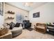 This bedroom features a couch, desk, and crib, making it the perfect place to relax and play at 2311 Horse Shoe Cir, Fort Lupton, CO 80621