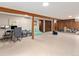 Open basement featuring wood accents and a large open space, perfect for a recreation or living area at 7105 Dover Way, Arvada, CO 80004