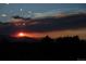 Scenic sunset view of mountains and cloudy sky from property at 7105 Dover Way, Arvada, CO 80004