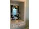 Charming built-in with glass shelves and drawers, perfect for displaying decor and storing items at 422 E 6Th Ave, Denver, CO 80203
