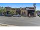 Commercial building showcasing a restaurant with outdoor patio seating, creating a vibrant street scene at 422 E 6Th Ave, Denver, CO 80203