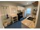 Functional kitchen with granite countertops, stainless steel appliances, and ample cabinet space at 422 E 6Th Ave, Denver, CO 80203