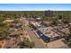Street view showcasing neighborhood with mixed-use buildings and residential homes lined with mature trees at 422 E 6Th Ave, Denver, CO 80203