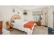 Calm bedroom featuring neutral colors, a window with natural light, and a cozy atmosphere at 3506 S Depew St # 3, Denver, CO 80235