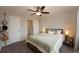 Upstairs bedroom with ceiling fan, double bed and ample closet space at 4632 S Pagosa Cir, Aurora, CO 80015