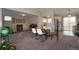 Open concept dining area with kitchen access and view of backyard at 4632 S Pagosa Cir, Aurora, CO 80015