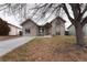 Nice curb appeal! This charming house features a well-maintained lawn and a welcoming front porch at 4632 S Pagosa Cir, Aurora, CO 80015