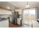 Updated kitchen, stainless steel appliances, and access to backyard at 4632 S Pagosa Cir, Aurora, CO 80015