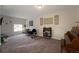 Relaxing living room with comfy seating and a lovely piano at 4632 S Pagosa Cir, Aurora, CO 80015