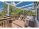 Beautiful outdoor deck with a grill, comfortable seating, and lots of natural light at 10155 Silver Maple Cir, Highlands Ranch, CO 80129