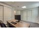 Finished basement office space with built-in storage and neutral colors at 10155 Silver Maple Cir, Highlands Ranch, CO 80129