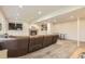 Well-lit finished basement with a fireplace, entertainment center, and ping pong table at 10155 Silver Maple Cir, Highlands Ranch, CO 80129