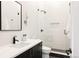 Elegant bathroom with a glass-enclosed shower, sleek vanity, and modern fixtures for a luxurious feel at 732 S Gaylord St, Denver, CO 80209