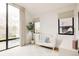 Charming Bedroom with a crib, hardwood floors, and large windows at 732 S Gaylord St, Denver, CO 80209