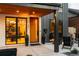 Elegant front entryway with a wooden door, showcasing modern lighting and interior views at 732 S Gaylord St, Denver, CO 80209